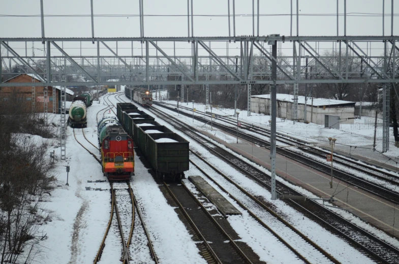 the railroad has snow on the tracks