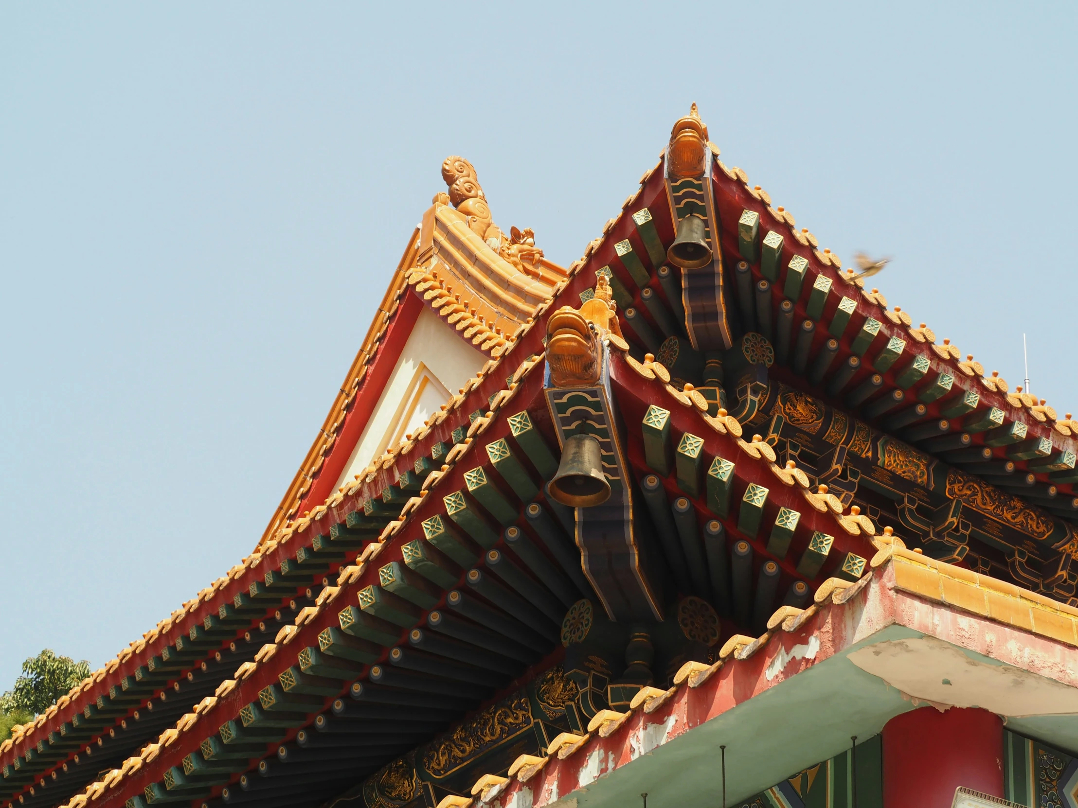 colorful oriental building with large pointed roof