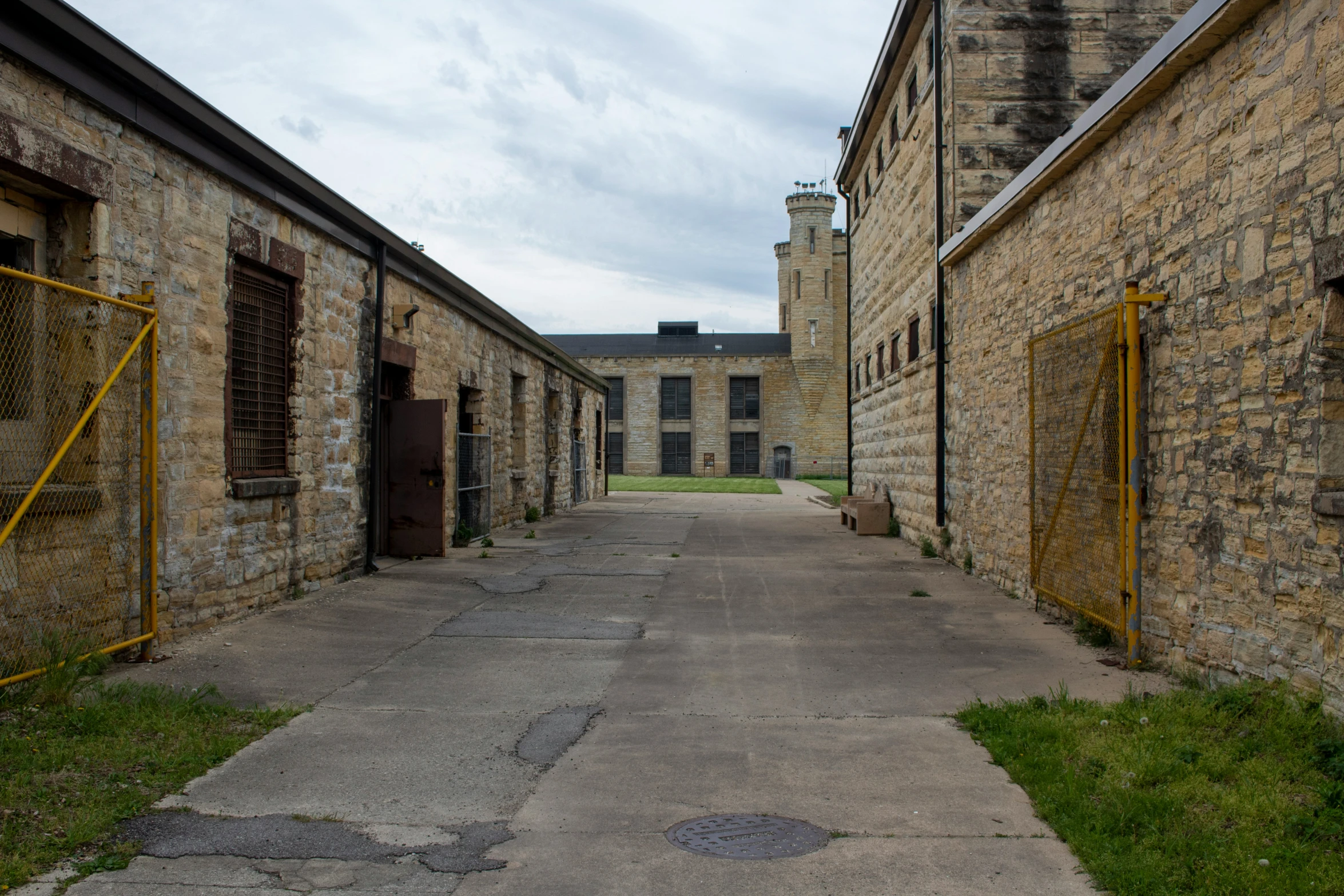 a courtyard that looks like old brick buildings