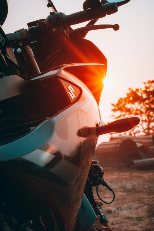 a motorcycle sitting parked on the side of a road