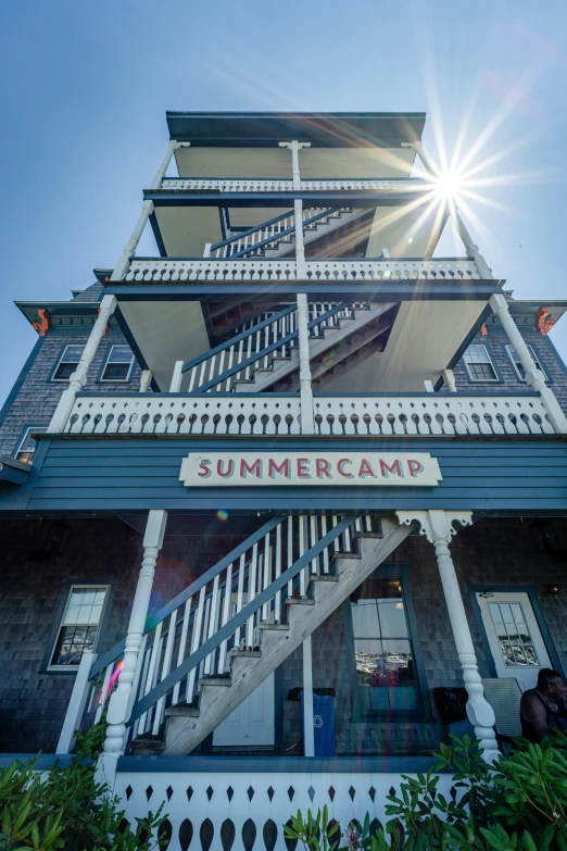 the building with steps leading to it, in summer