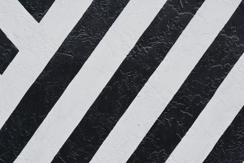 an abstract art picture of white black stripes on an orange ground