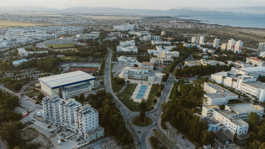 an aerial view of city and beach area