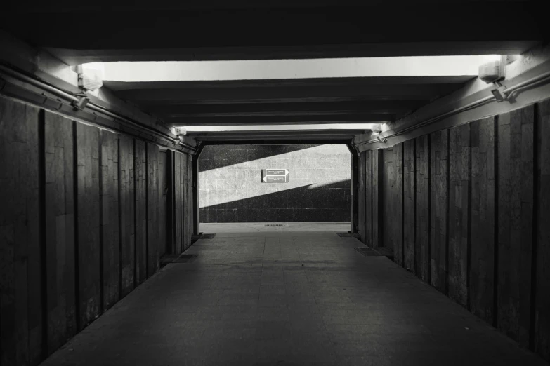 the long hallway leading to the basketball court