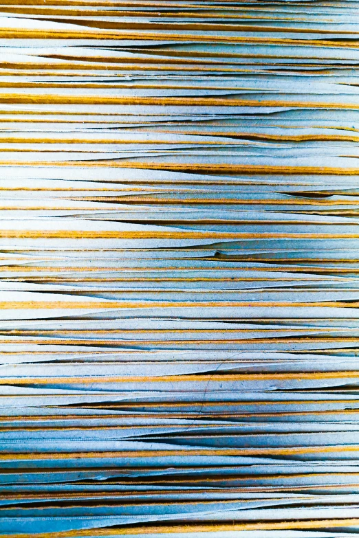 an abstract blurry pattern with blue, green and brown colors