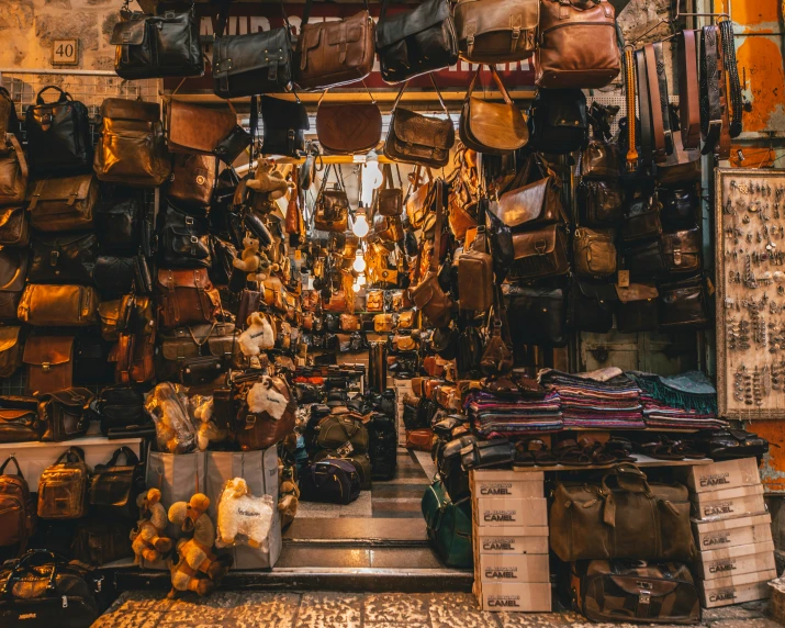 various bags and other items hanging in an asian market