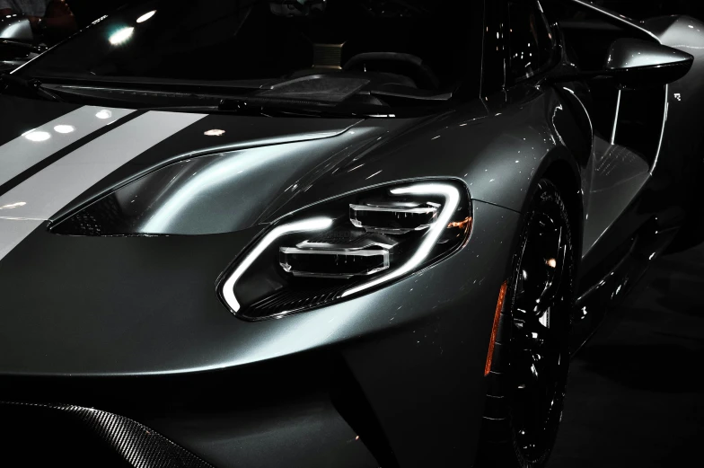 a close up of the front grille of a black sports car