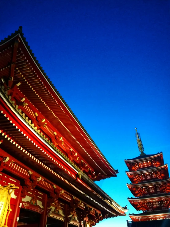 a long line of tall buildings with oriental style architecture