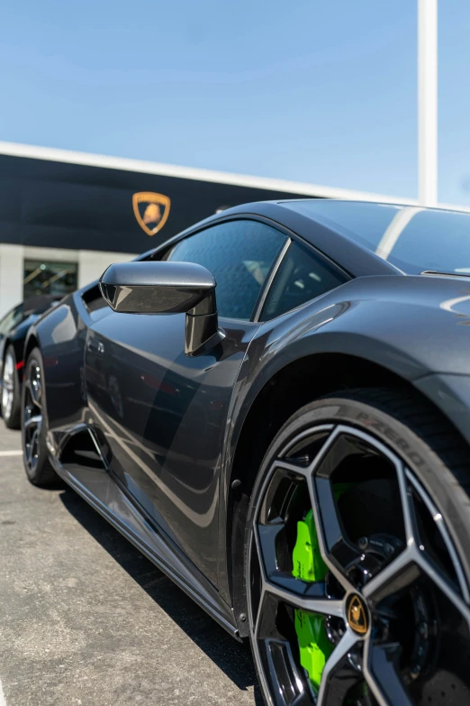 a black sports car in a parking lot