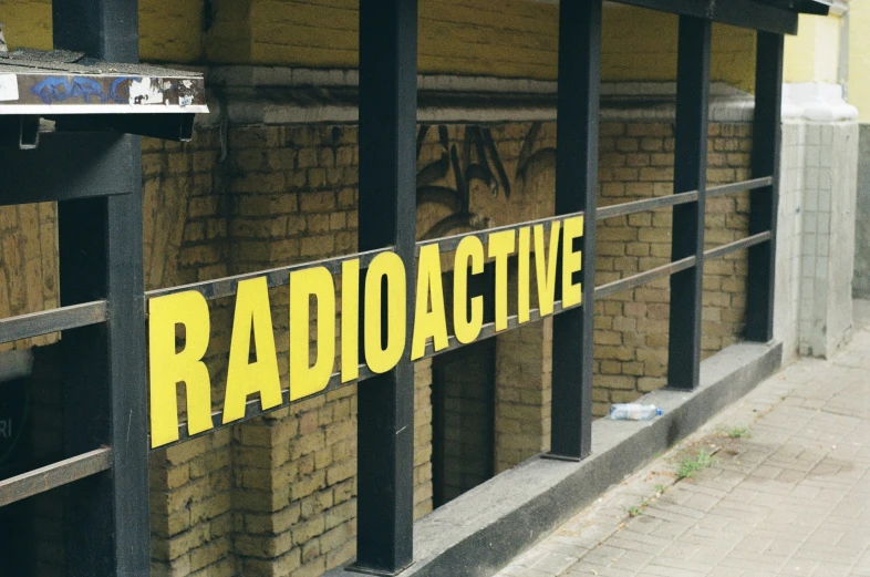 a building that is being torn down and advertising radio active