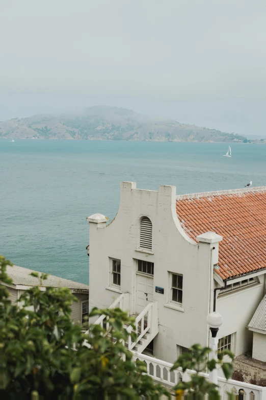 there is an old building on the side of a hill