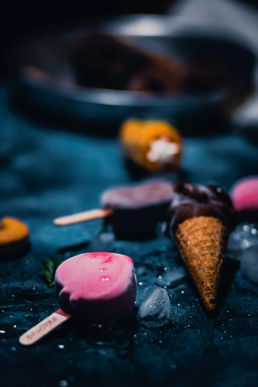 a table covered in pink, yellow and white candies