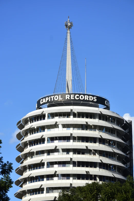 a tall building with a sign that reads capitol records