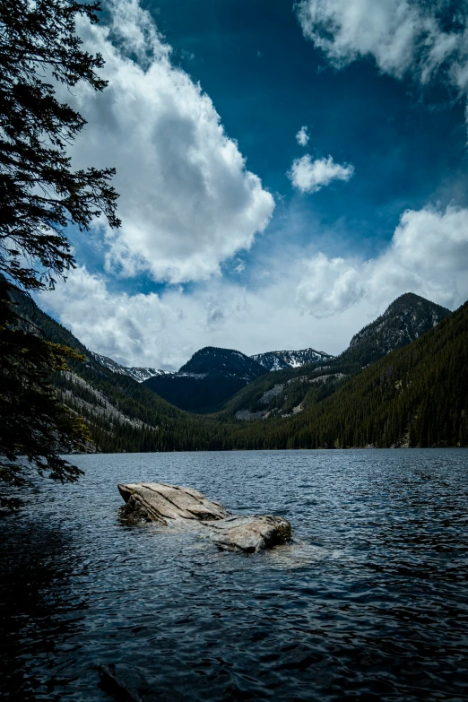 a large body of water near a mountain range