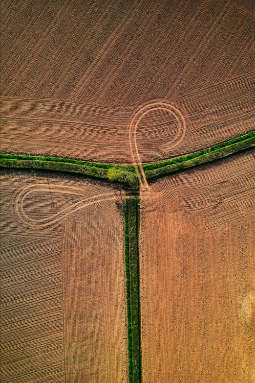 a piece of fabric with some green thread