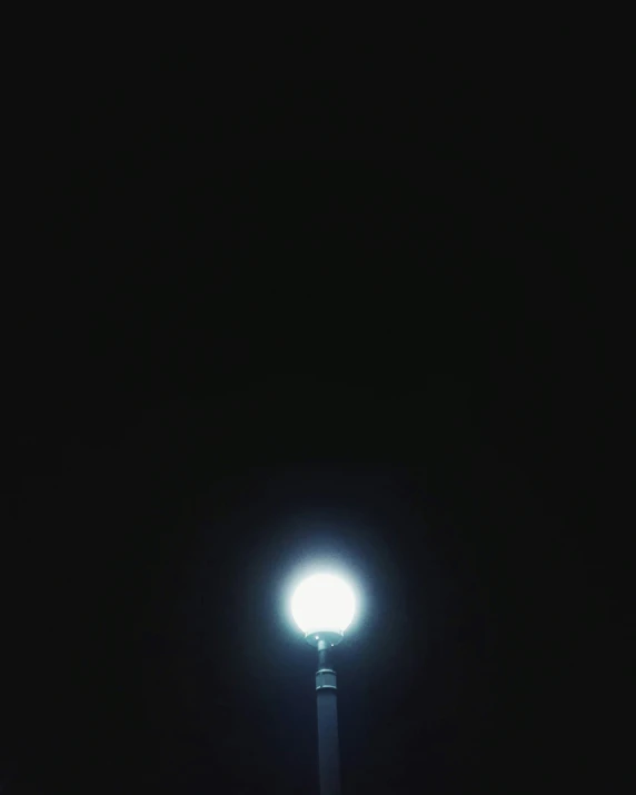 street lamp in the dark against the dark background