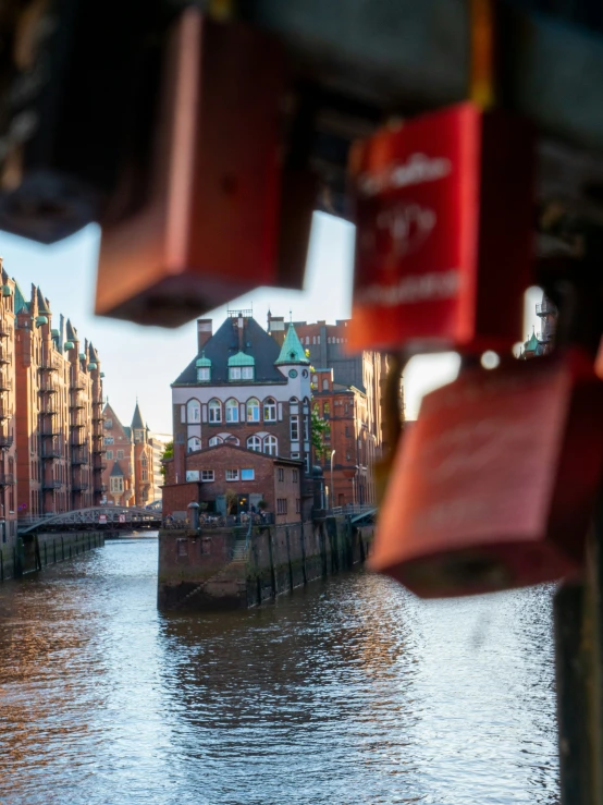 a group of buildings in front of water with many locks