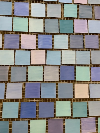 several different colors of tile on top of each other