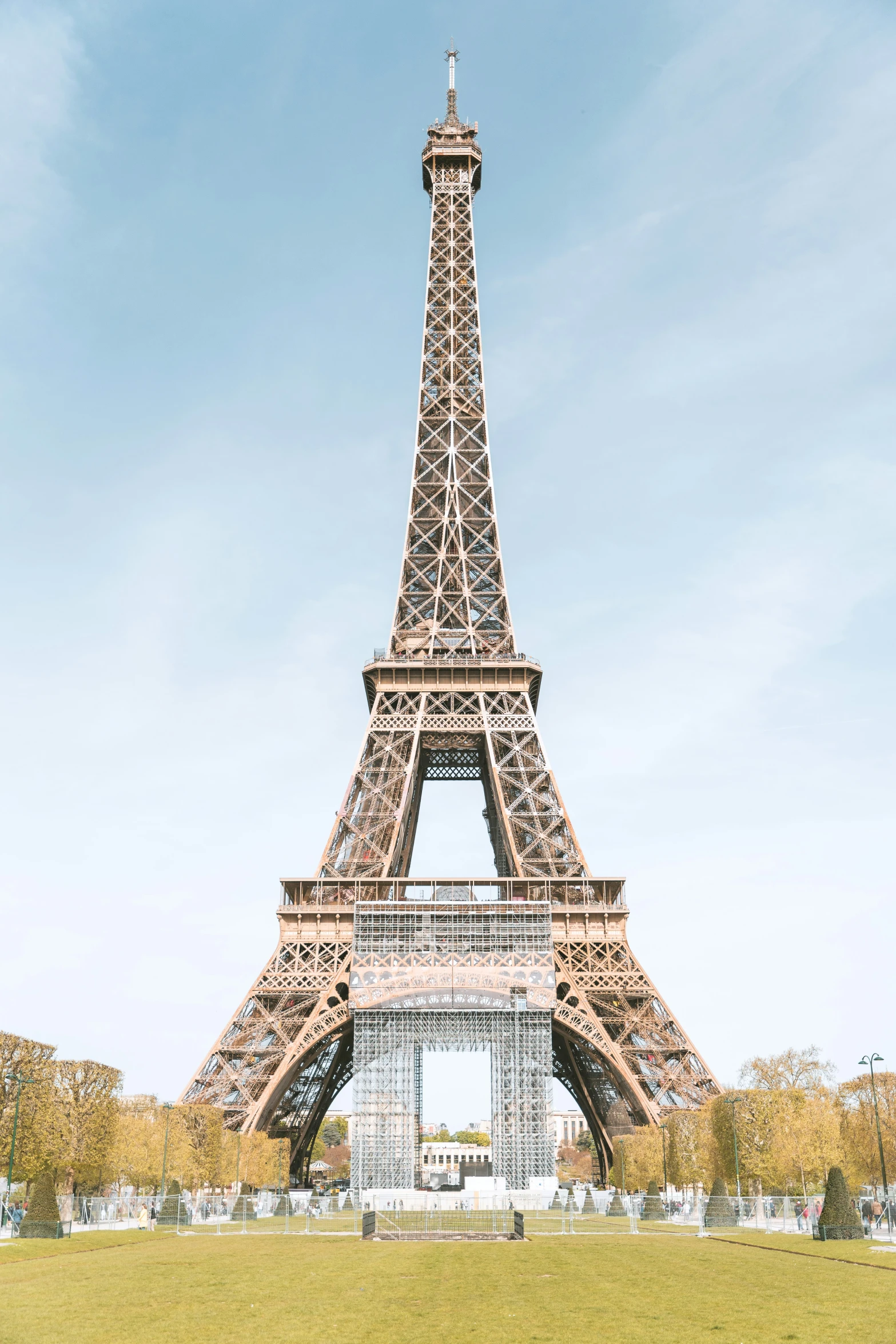 the large tower is standing in front of a blue sky