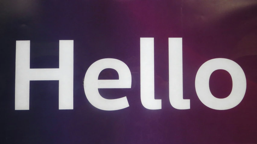 the word hello painted on top of a blue background