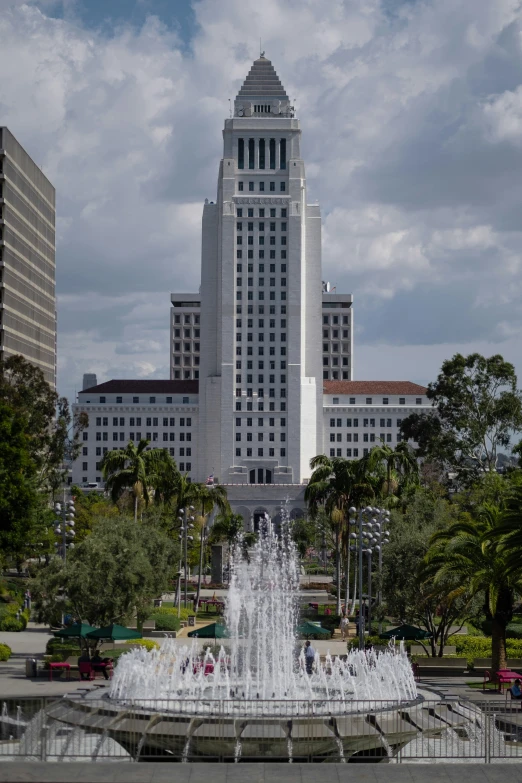 a view of a skyscr with a fountain in the foreground