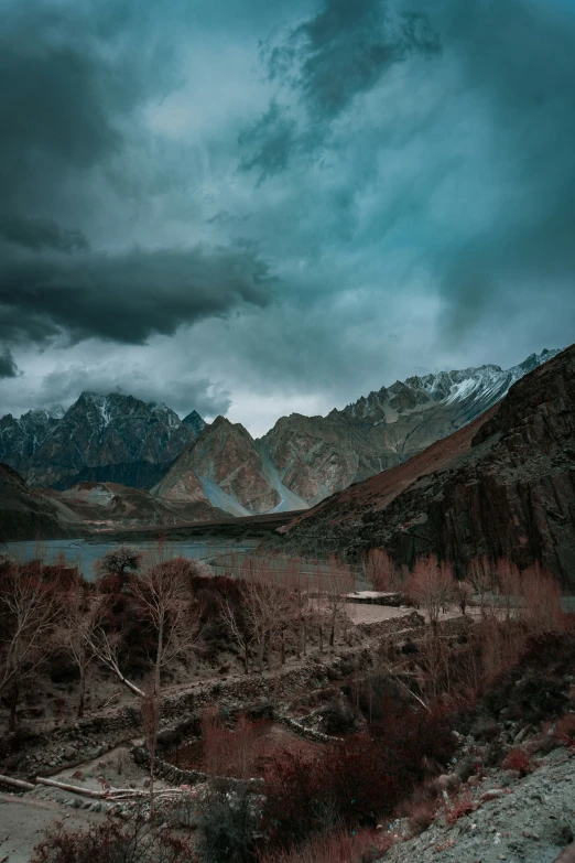 an image of a mountain scene during a stormy day