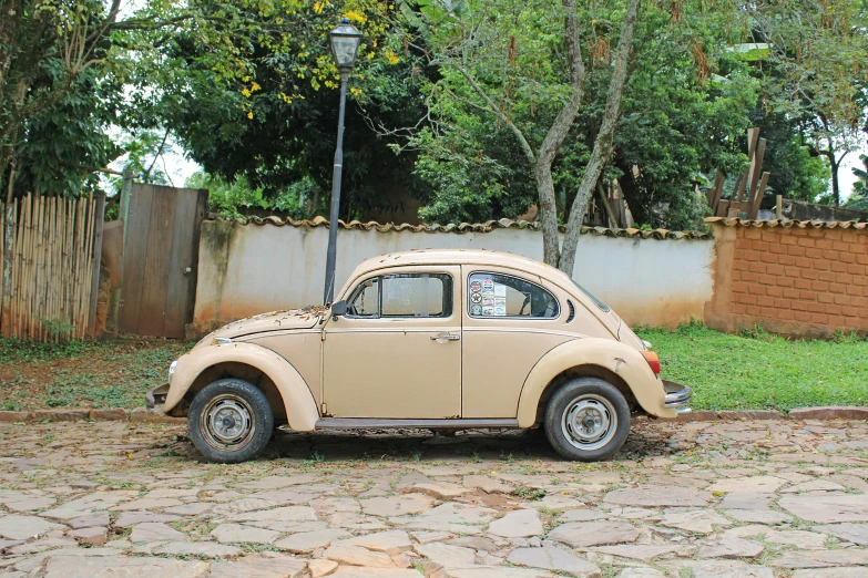 a small car that is parked in the driveway