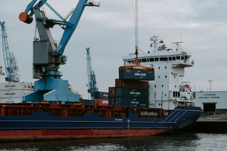 a large cargo ship docked in a dock