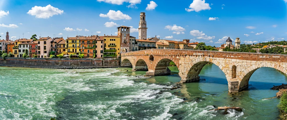 a view of a very pretty town next to a river