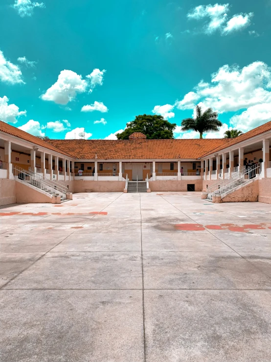 a building that has a large open area with stairs