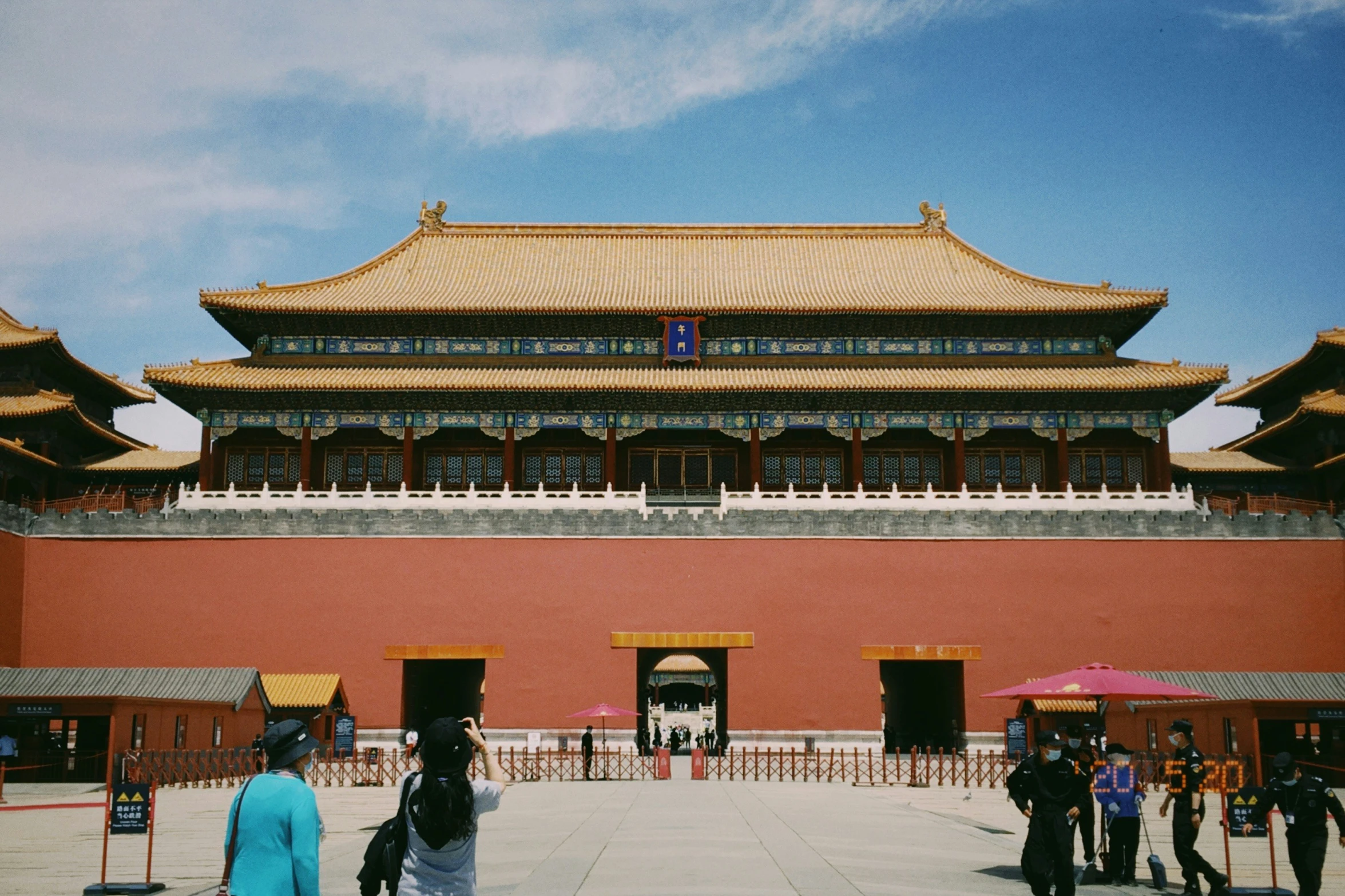 this is a s of people outside the forbidden city wall