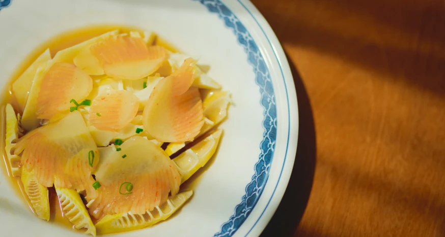 some pasta with sauce on top of a plate