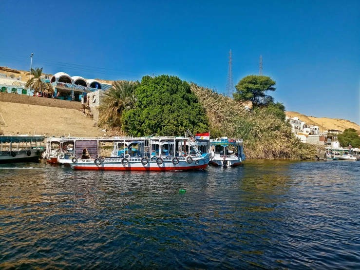 there are several ferrys on the water