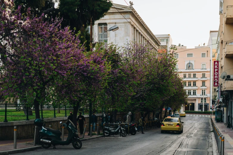 a street filled with motorcycles and motor scooters