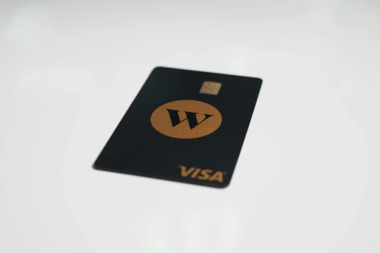 a visa card on top of a white surface