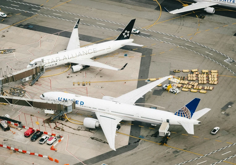 a large white airplane in an air port