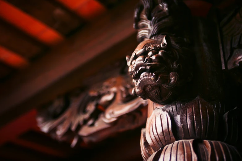 a closeup of carved wooden carvings on a building
