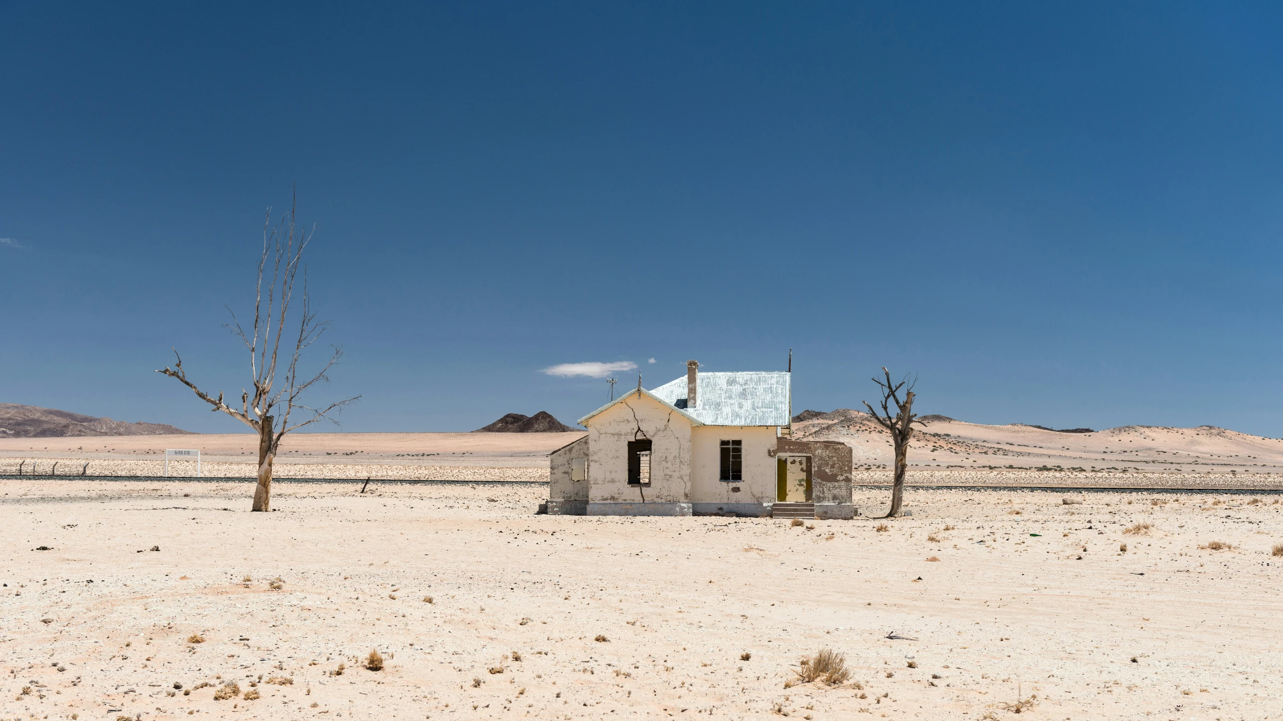 the old house on the empty beach is abandoned