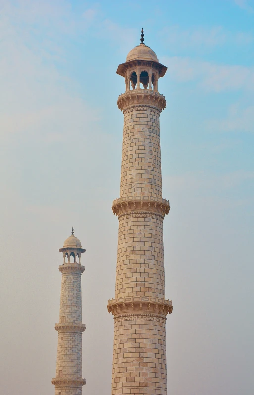 two tower like structures are in the water