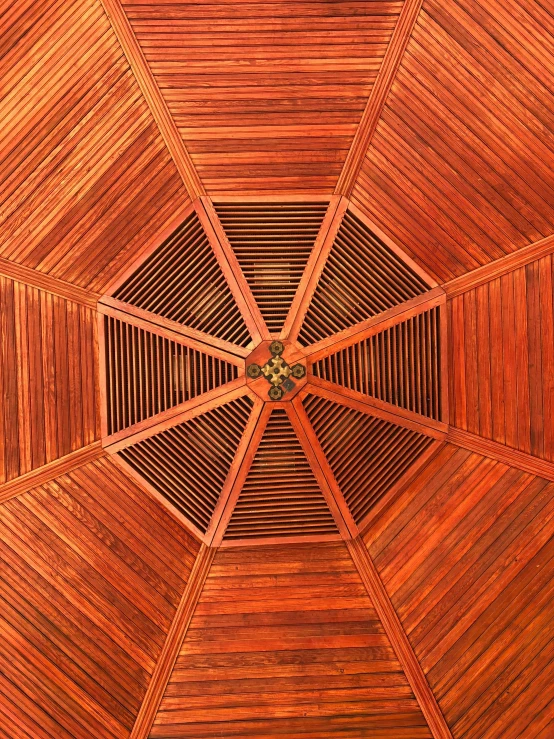 a wooden structure that is inside of the ceiling