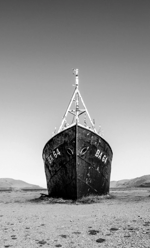 a ship is shown out in the sand