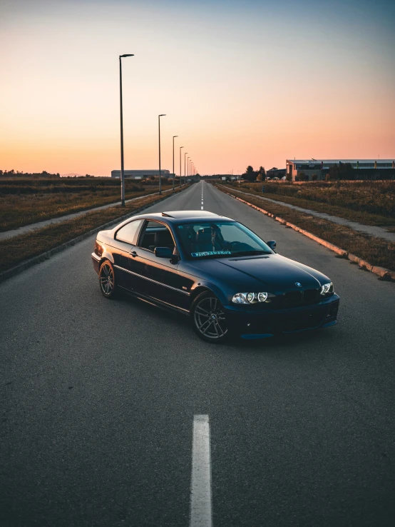 an automobile parked on the side of the road