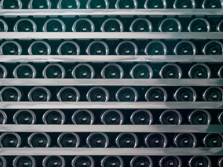 rows of steel tubes lined up at a wine cellar