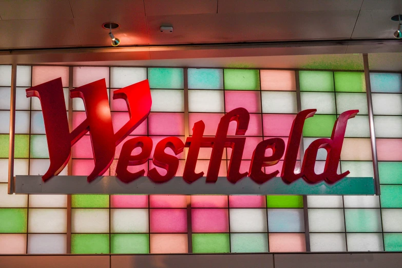a window on the wall in front of a sign that says westfield