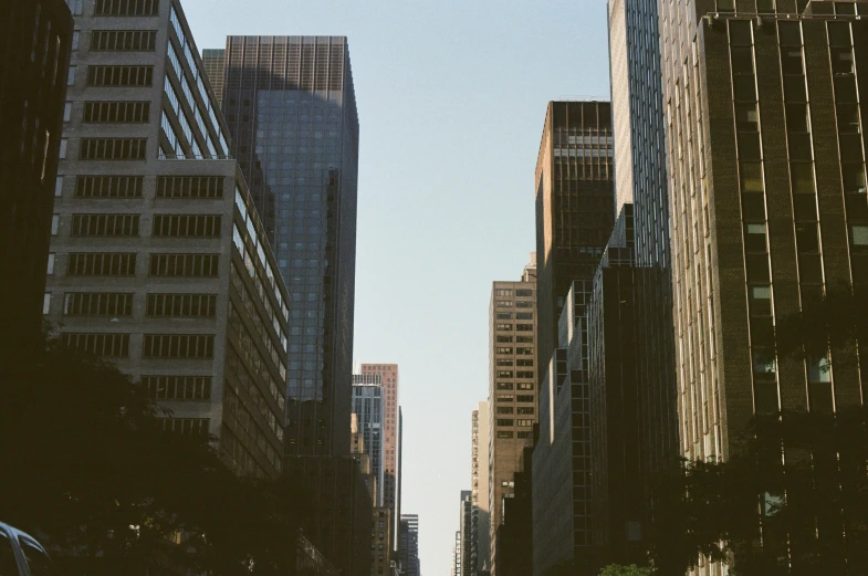 looking up at skyscrs on a very clear day