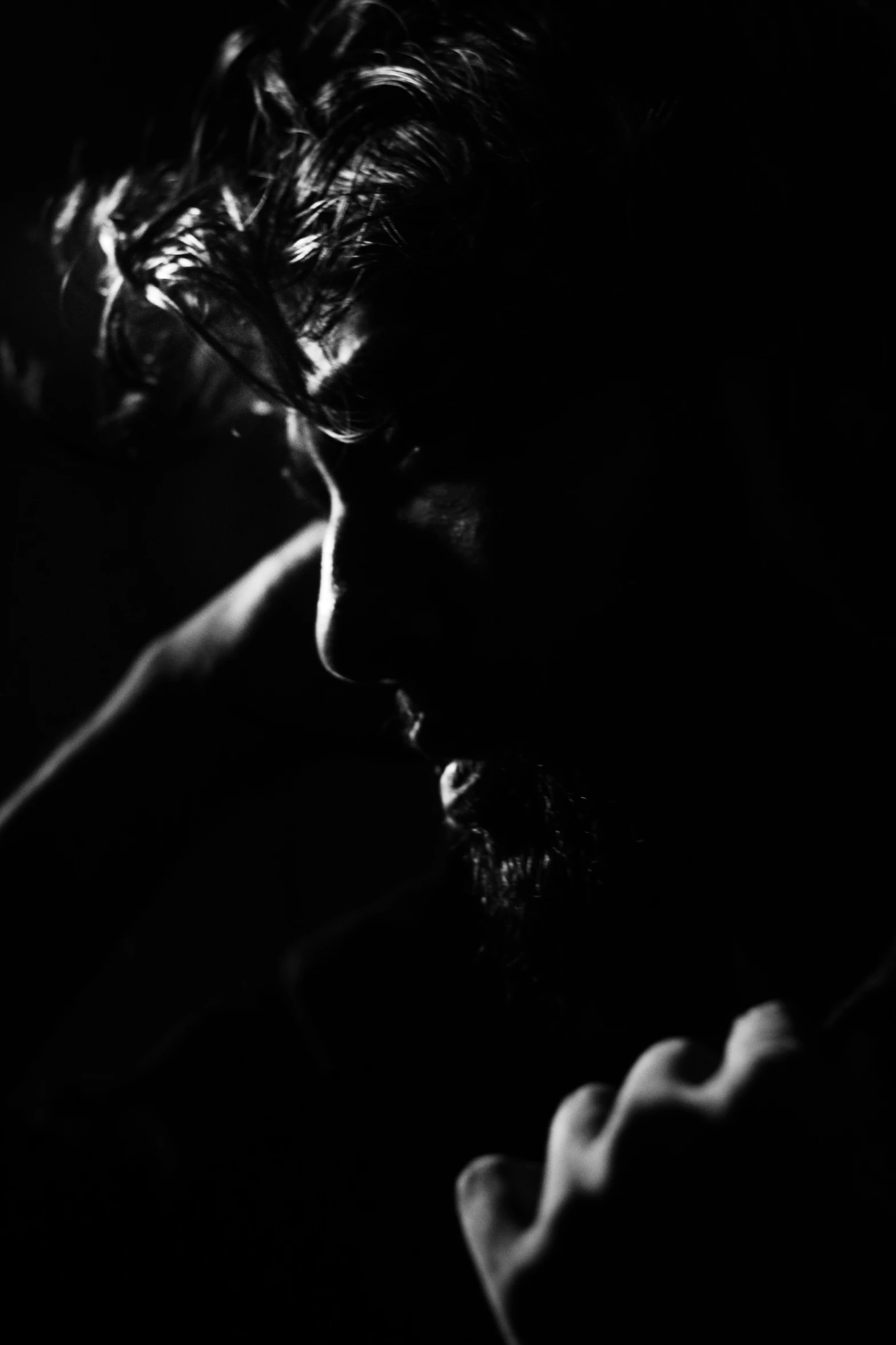 black and white pograph of a man with beard and glasses