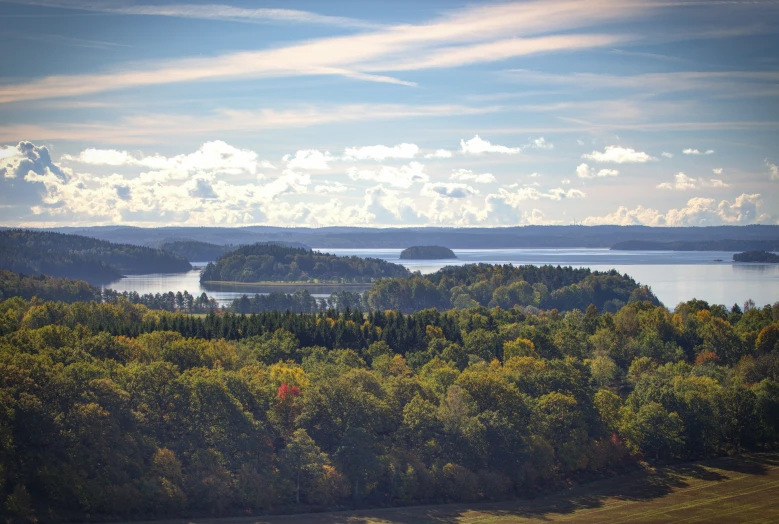 the view over the landscape from the overlook point of a lake