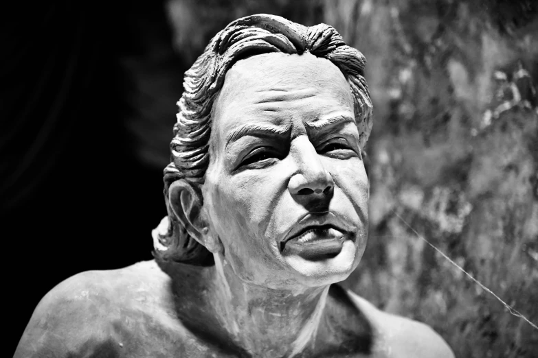 a statue of a man has a wrinkles in his face