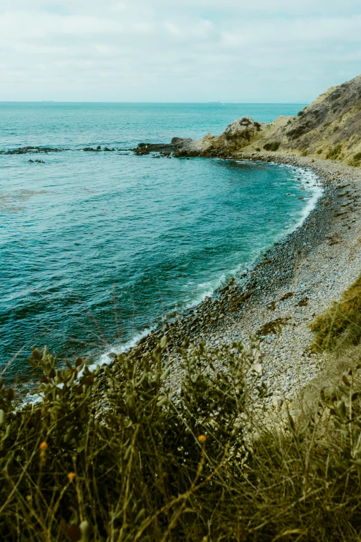 a view of the beach from near the cliff