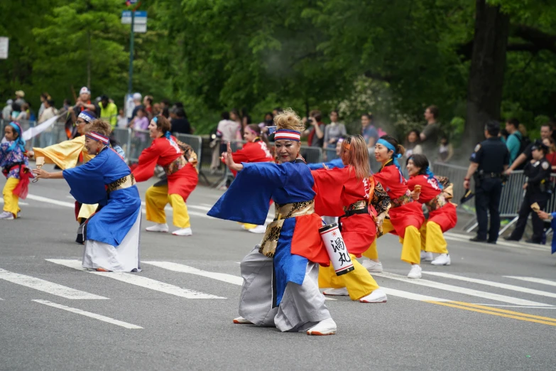 a parade going by people dressed in costumes